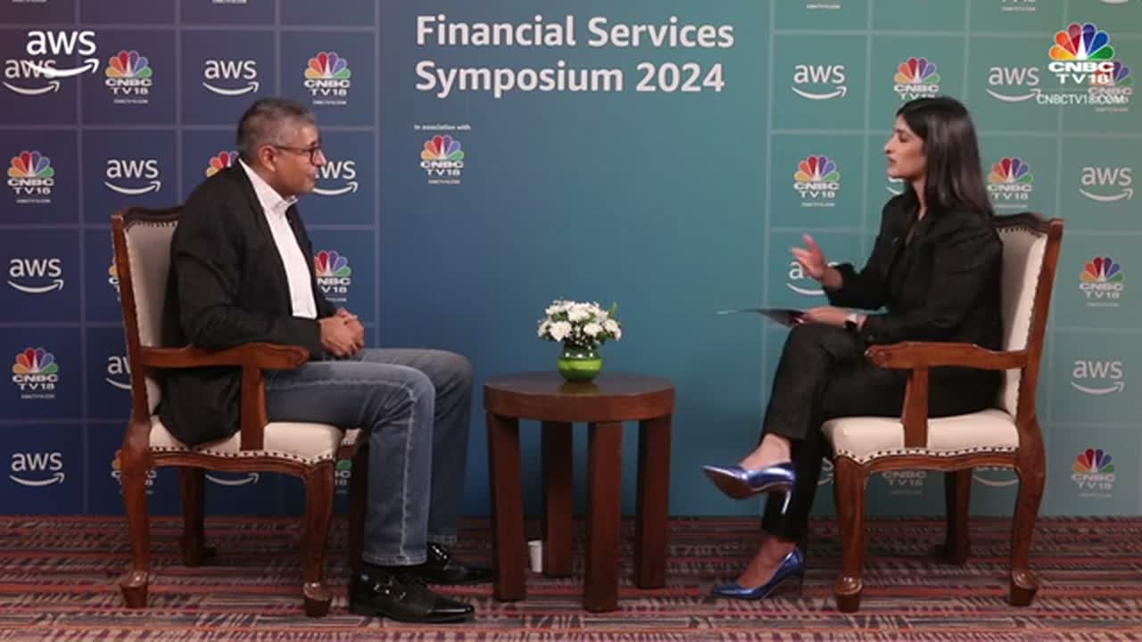 Deepak Chandani seated with the interviewer during the CNBC-TV18 and AWS Fintech Transformation conversation